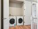 Laundry area features a washer and dryer, ample natural light, and convenient location at 3482 E 28Th Ave, Denver, CO 80205