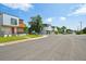 Modern homes line a quiet street with manicured lawns at 3482 E 28Th Ave, Denver, CO 80205