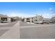 Exterior view of condo complex featuring covered parking spaces at 8406 Pebble Creek Way # 202, Highlands Ranch, CO 80126