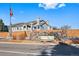 Canyon Ranch entrance featuring stone signage and American flag at 8406 Pebble Creek Way # 202, Highlands Ranch, CO 80126