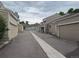 Row of townhome garages in a well-maintained community, showcasing convenient parking at 5898 W Asbury Pl, Lakewood, CO 80227