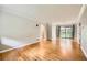 Open living room with hardwood floors and sliding doors leading to the yard at 2565 S Gaylord St, Denver, CO 80210