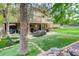 Outdoor patio featuring ample seating and lush backyard landscaping at 8866 E Easter Ave, Centennial, CO 80112