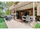 Large covered patio featuring outdoor seating, dining area, and overhead lighting for year-round enjoyment at 8866 E Easter Ave, Centennial, CO 80112
