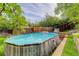 Backyard pool surrounded by a wooden fence at 8866 E Easter Ave, Centennial, CO 80112