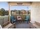 Relaxing balcony with seating and views of the surrounding complex and landscaped grounds at 3035 Oneal Pkwy # 35T, Boulder, CO 80301