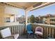 Cozy balcony with multiple seats and exterior views of the parking area and surrounding neighborhood at 3035 Oneal Pkwy # 35T, Boulder, CO 80301