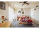 Charming bedroom with a ceiling fan, string lights, and a cozy atmosphere at 3035 Oneal Pkwy # 35T, Boulder, CO 80301