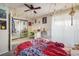 Bright bedroom featuring a desk area, string lights, and ample natural light at 3035 Oneal Pkwy # 35T, Boulder, CO 80301