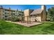 Exterior view of community playground featuring green lawn and tan buildings at 3035 Oneal Pkwy # 35T, Boulder, CO 80301