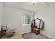 Neutral-colored bedroom features a window and natural light at 12143 Dahlia Dr, Thornton, CO 80241