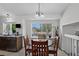 Dining Area features stainless steel appliances, backyard views, and light interior design at 12143 Dahlia Dr, Thornton, CO 80241
