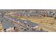 Aerial image showcases a well-planned community with apartments featuring spacious green areas with mature landscaping at 8944 Fox Dr, Denver, CO 80260