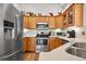 Beautiful kitchen with stainless steel appliances, and ample cabinet space at 8944 Fox Dr, Denver, CO 80260