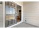 Private outdoor patio with sliding glass door access at 8944 Fox Dr, Denver, CO 80260