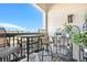 Relaxing outdoor patio with bar-height seating offering views of the surrounding neighborhood at 8944 Fox Dr, Denver, CO 80260