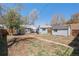 Spacious backyard with patio, shed and plenty of room for recreation and relaxation at 3768 S Acoma St, Englewood, CO 80110