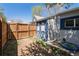 Fenced backyard with shed at 3768 S Acoma St, Englewood, CO 80110