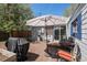 Backyard patio includes dining, lounge set and grill, perfect for outdoor entertaining at 3768 S Acoma St, Englewood, CO 80110