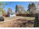 Private backyard with a storage shed and mature trees at 3768 S Acoma St, Englewood, CO 80110