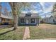 Charming home featuring stone pathway, covered porch, and inviting curb appeal in a quiet neighborhood at 3768 S Acoma St, Englewood, CO 80110