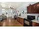 Functional kitchen featuring sleek countertops, stainless steel appliances, and open layout at 3768 S Acoma St, Englewood, CO 80110
