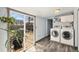 Bright laundry room with modern washer and dryer at 3768 S Acoma St, Englewood, CO 80110