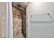 Tiled shower with pebble flooring and rainfall shower head at 3768 S Acoma St, Englewood, CO 80110