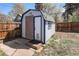 Backyard shed featuring a classic design and fenced perimeter at 3768 S Acoma St, Englewood, CO 80110