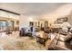 Expansive living room with kitchen and dining views at 6922 W Walden Pl, Littleton, CO 80128