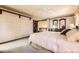 Spacious main bedroom featuring a ceiling fan, and decorative wall trim at 6922 W Walden Pl, Littleton, CO 80128
