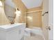 Well-maintained bathroom with tile surround and modern fixtures and new vanity at 12664 W Virginia Ave, Lakewood, CO 80228