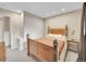 Bedroom with closet, side table, and warm color scheme at 12664 W Virginia Ave, Lakewood, CO 80228