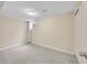 Empty carpeted bedroom with window and neutral walls at 12664 W Virginia Ave, Lakewood, CO 80228