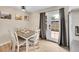 Inviting dining area with natural light, and a door leading to the backyard at 12664 W Virginia Ave, Lakewood, CO 80228
