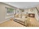 Relaxing living room with a cozy fireplace and comfortable seating area at 12664 W Virginia Ave, Lakewood, CO 80228