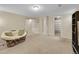 Spacious living room with carpet, comfortable seating, and ample natural light at 12664 W Virginia Ave, Lakewood, CO 80228