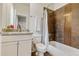Bathroom with tiled shower/bathtub and vanity at 2224 N Humboldt St, Denver, CO 80205