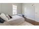 Well lit bedroom featuring hardwood floors and neutral walls and trim at 2224 N Humboldt St, Denver, CO 80205