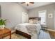 Comfortable bedroom features a ceiling fan and a decorative patterned rug at 2224 N Humboldt St, Denver, CO 80205