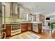 Well-appointed kitchen features stainless steel appliances and granite countertops at 2224 N Humboldt St, Denver, CO 80205