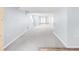 Expansive basement area with plush carpet and a walkout entrance at 5282 E 116Th Ave, Thornton, CO 80233