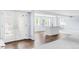 Open basement layout with wood flooring and natural light at 5282 E 116Th Ave, Thornton, CO 80233