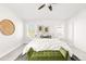 Serene bedroom with neutral tones, comfortable bedding, and natural light at 5282 E 116Th Ave, Thornton, CO 80233