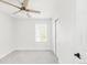 Spacious bedroom featuring a ceiling fan and natural light at 5282 E 116Th Ave, Thornton, CO 80233