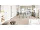 Bright kitchen with modern countertops, island with seating, and stainless steel appliances at 5282 E 116Th Ave, Thornton, CO 80233