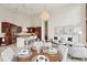 Open concept space with a gourmet kitchen, dining area, and comfortable living space at 6180 E Quincy Ave, Cherry Hills Village, CO 80111