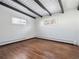 Bedroom featuring hardwood floors and neutral walls at 4348 S Jason St, Englewood, CO 80110