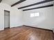 Bright bedroom with hardwood floors and spacious closet at 4348 S Jason St, Englewood, CO 80110