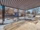 Covered patio with view of shed and yard at 4348 S Jason St, Englewood, CO 80110